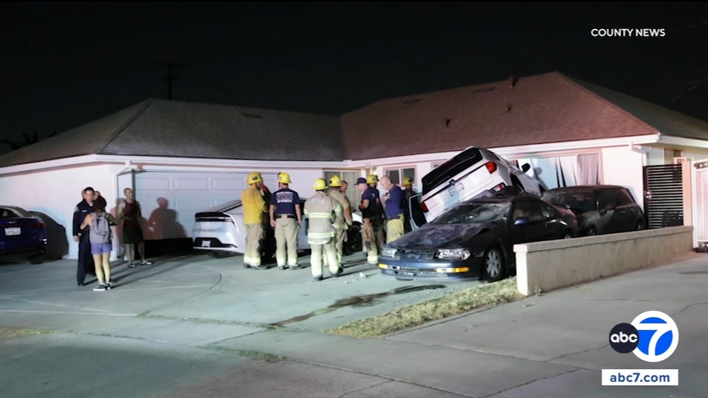 SUV goes airborne, crashes into 2 cars and Santa Ana house