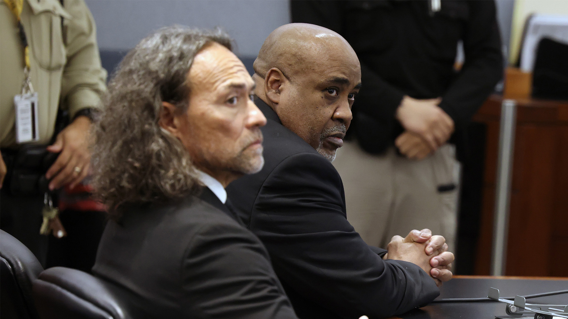 Duane Davis, right, and his attorney Michael Sanft sit in a courtroom after a jury found Davis guilty of first-degree murder in his trial related to the 1996 killing of rapper Tupac Shakur on Aug. 31, 2026, in Las Vegas.