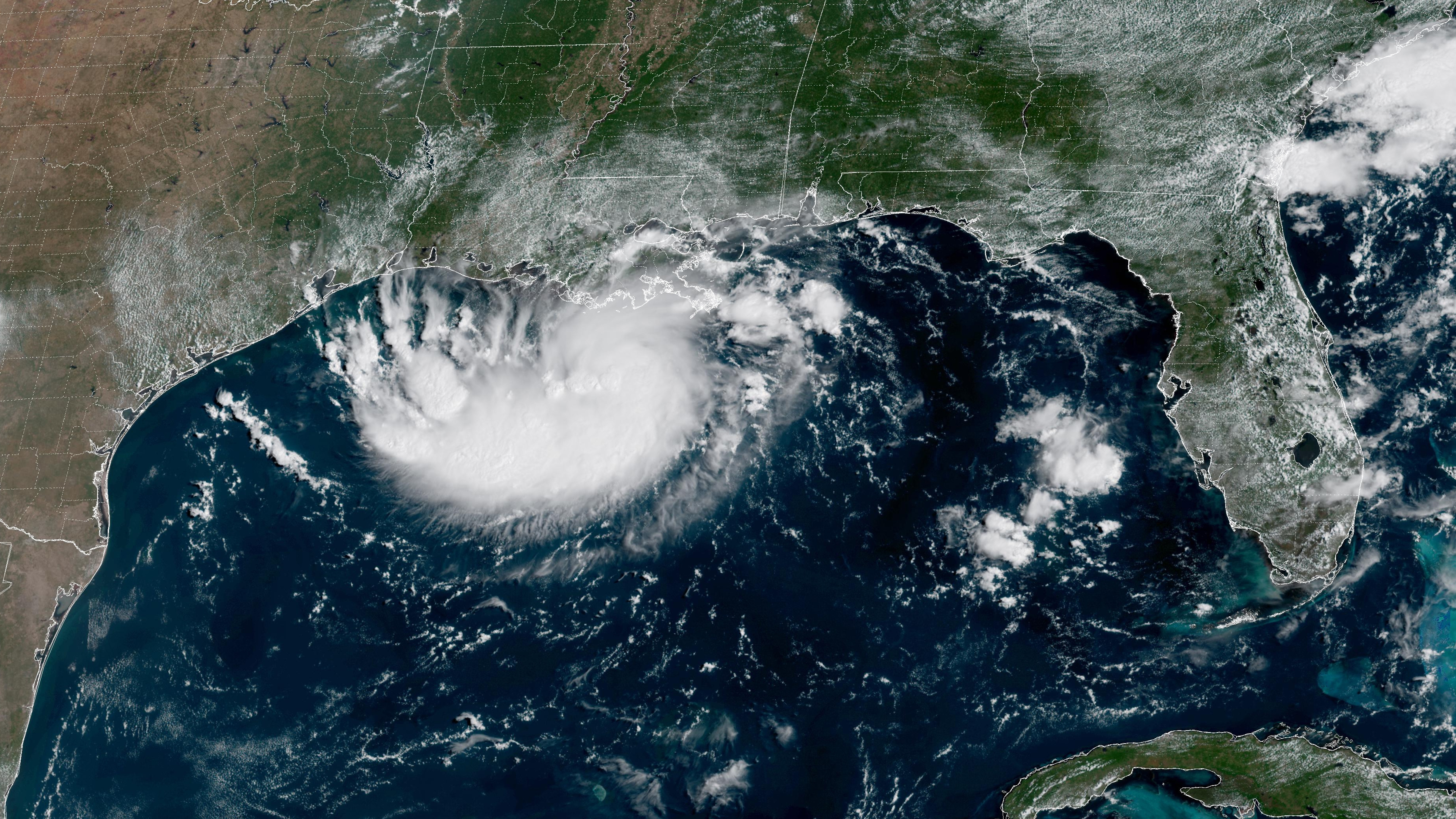 This satellite image released by NOAA shows Potential Tropical Cyclone Five forming over the Gulf of Mexico on Monday, Aug. 31, 2026.