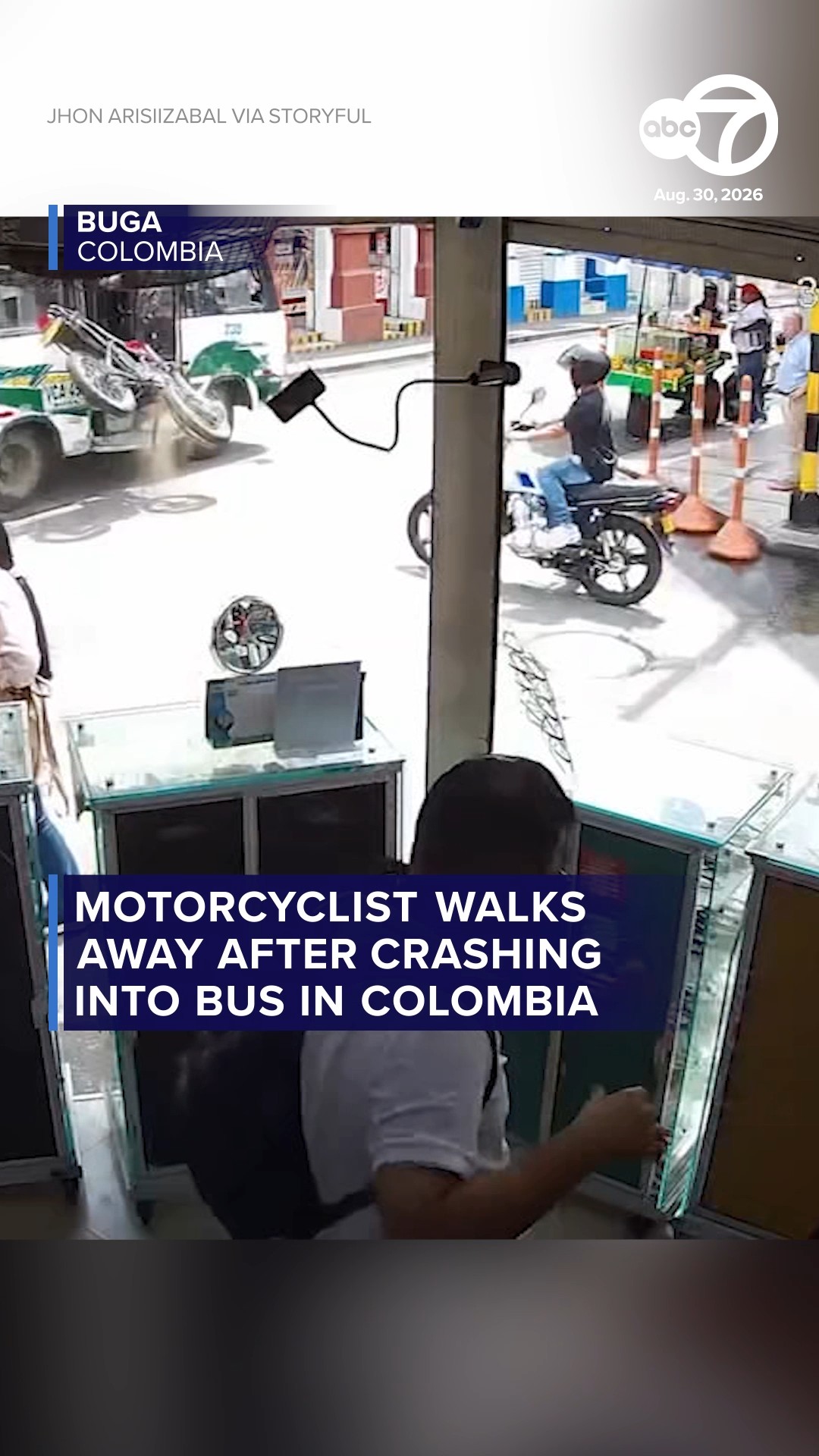Motorcyclist walks away after crashing into bus in Colombia