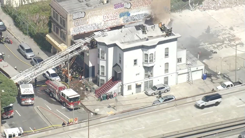 Oakland firefighters knock down multi-building fire on Webster St.