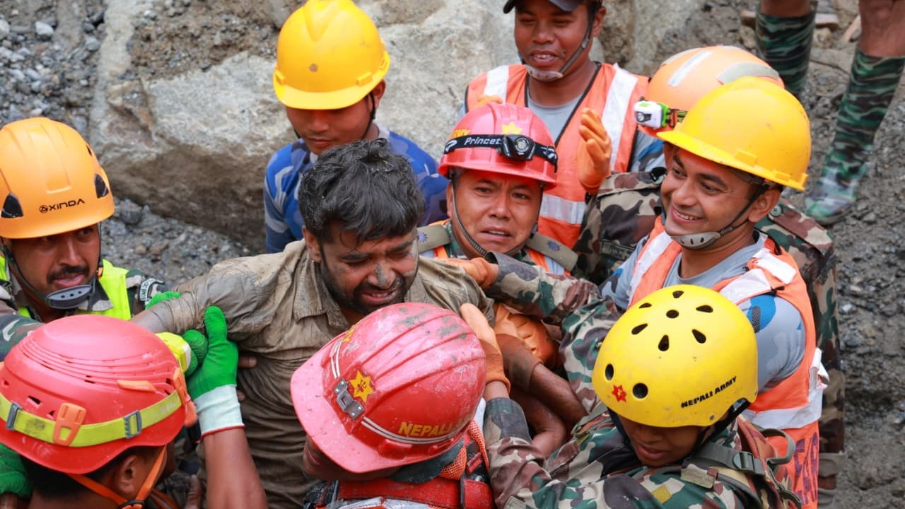 Soldiers rescue a worker alive from a tunnel during an ongoing operation at the Trishuli-3A hydropower project in Nepal's Rasuwa district, Friday, Sept. 4, 2026.