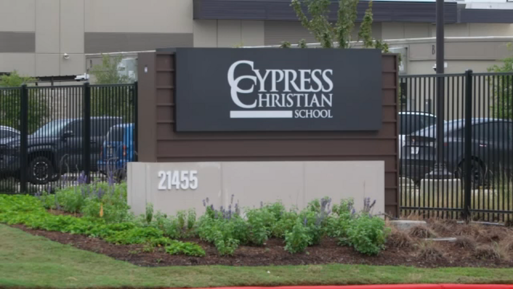 Former private school worker faces charges involving underage boy