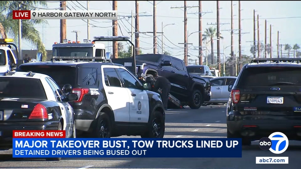 Officers, tow trucks, buses: LAPD responds to massive street takeover
