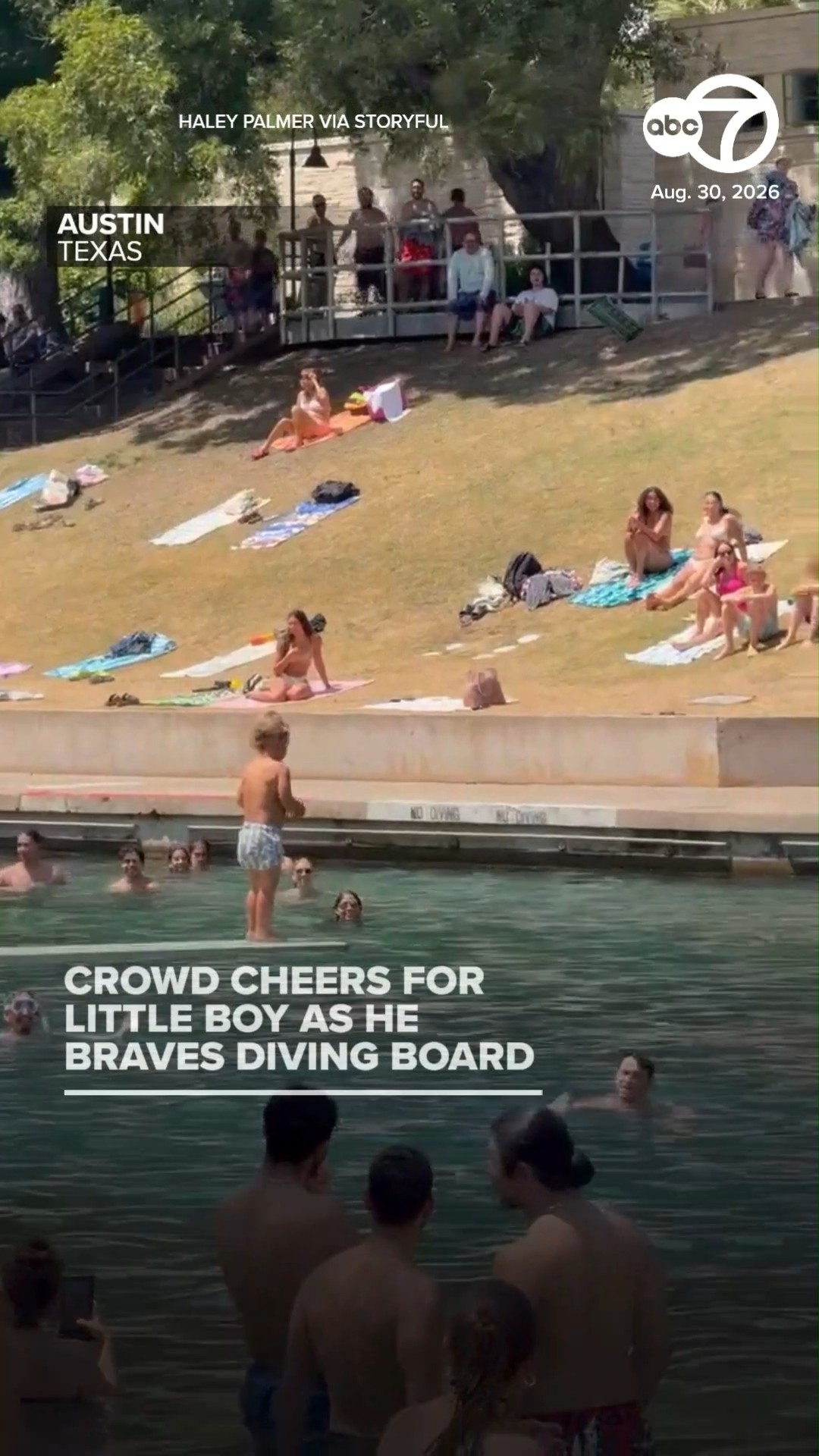 Crowd Cheers for Little Boy as He Braves Diving Board