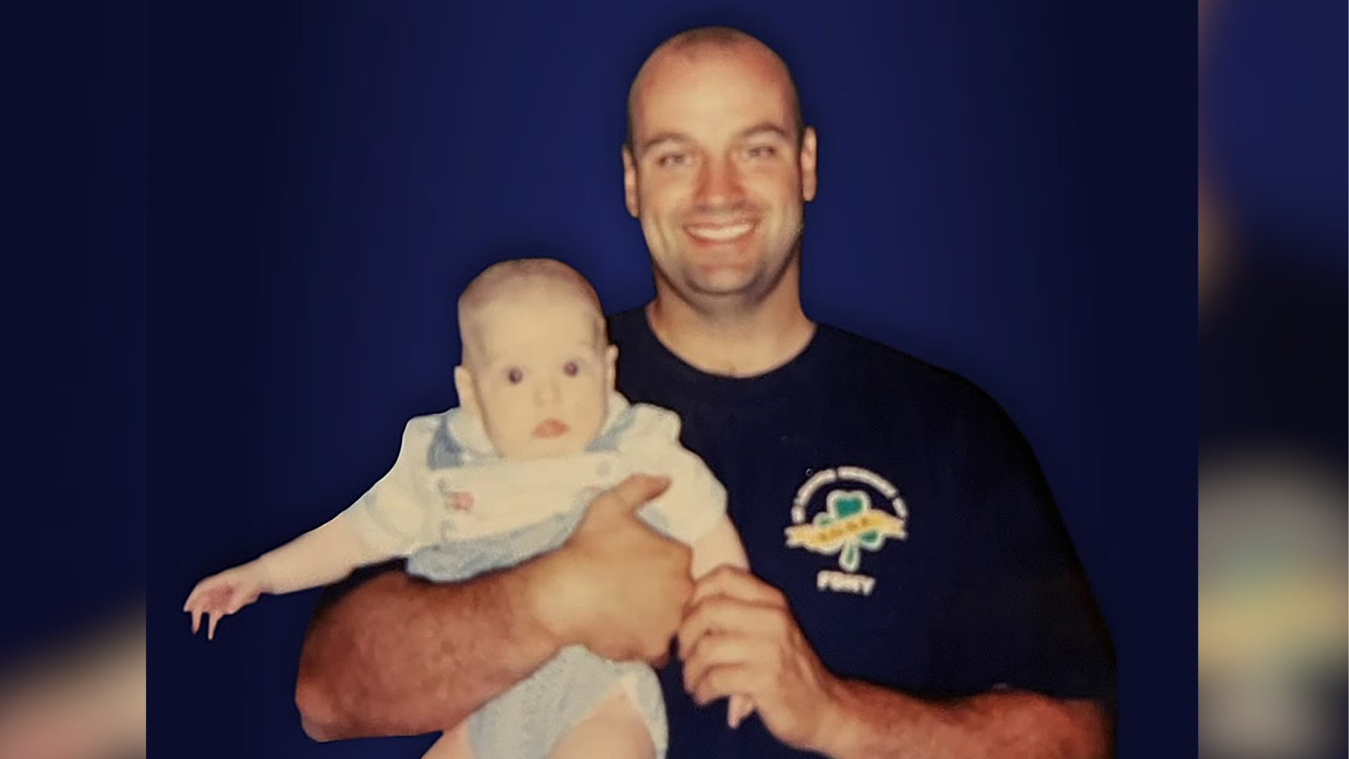 An undated photo of Stephen Siller Jr. as a baby with his father, New York City firefighter Stephen Siller.