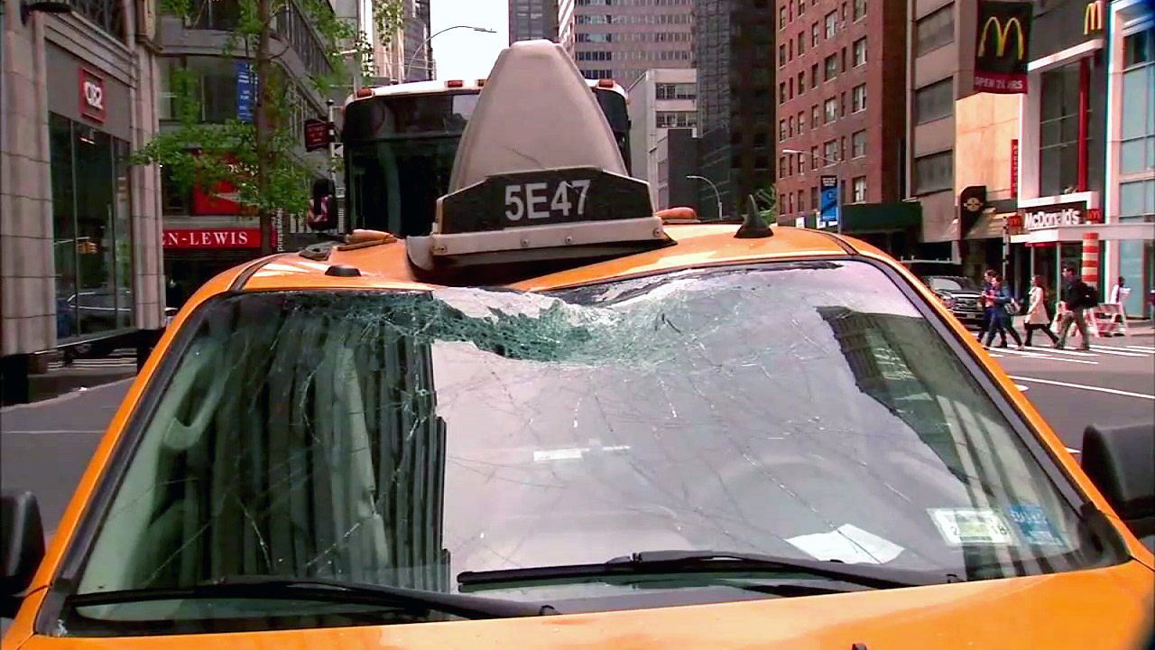 Crowbar from high rise under construction smashes into taxi