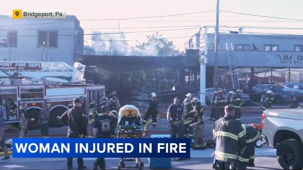 Woman hospitalized in multi-alarm fire at Montgomery County car dealership