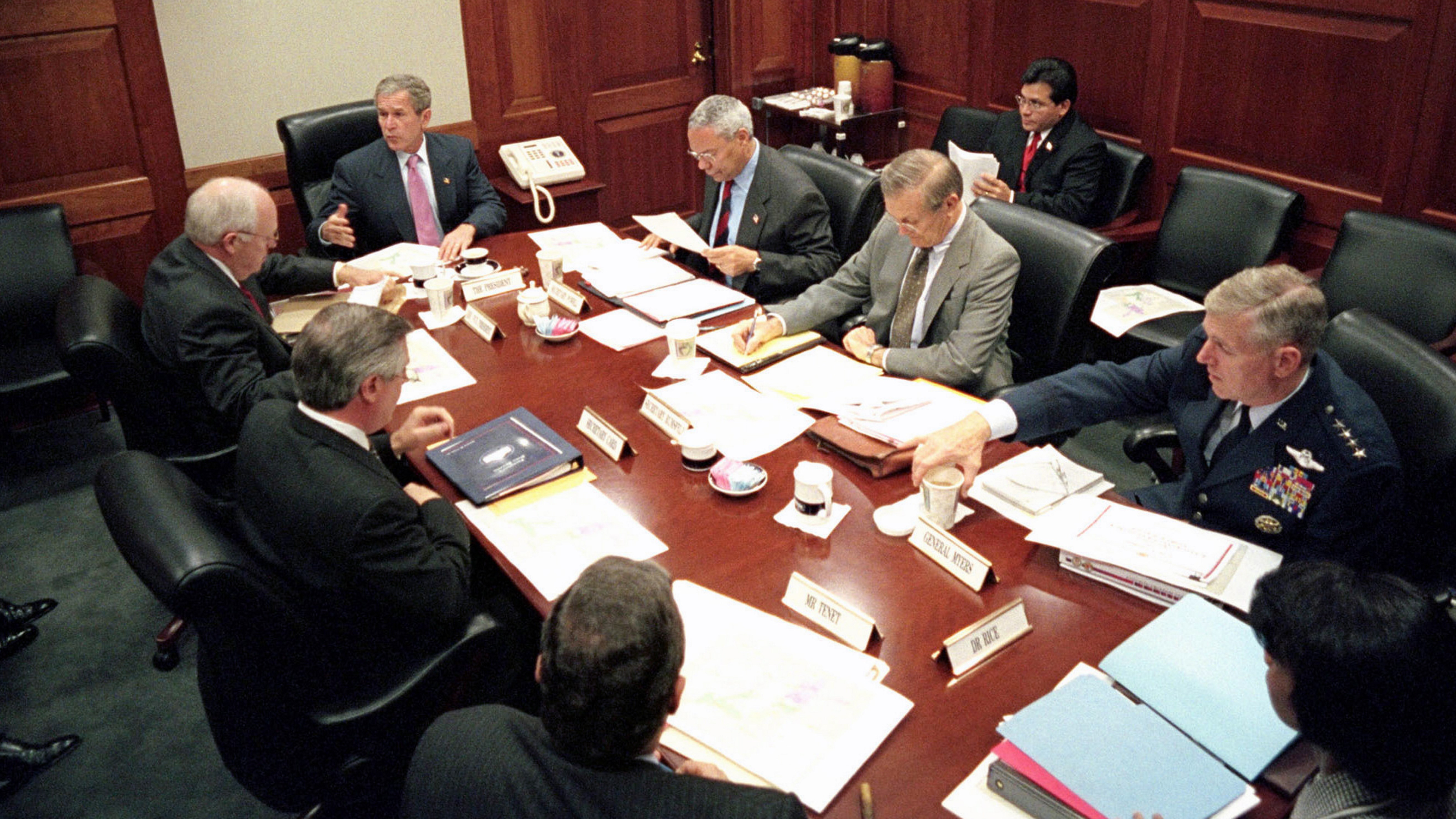 President George W Bush, meets with top security and government officials, in the White House situation Room, during the aftermath days following the September 11th 2001 terrorist attacks.