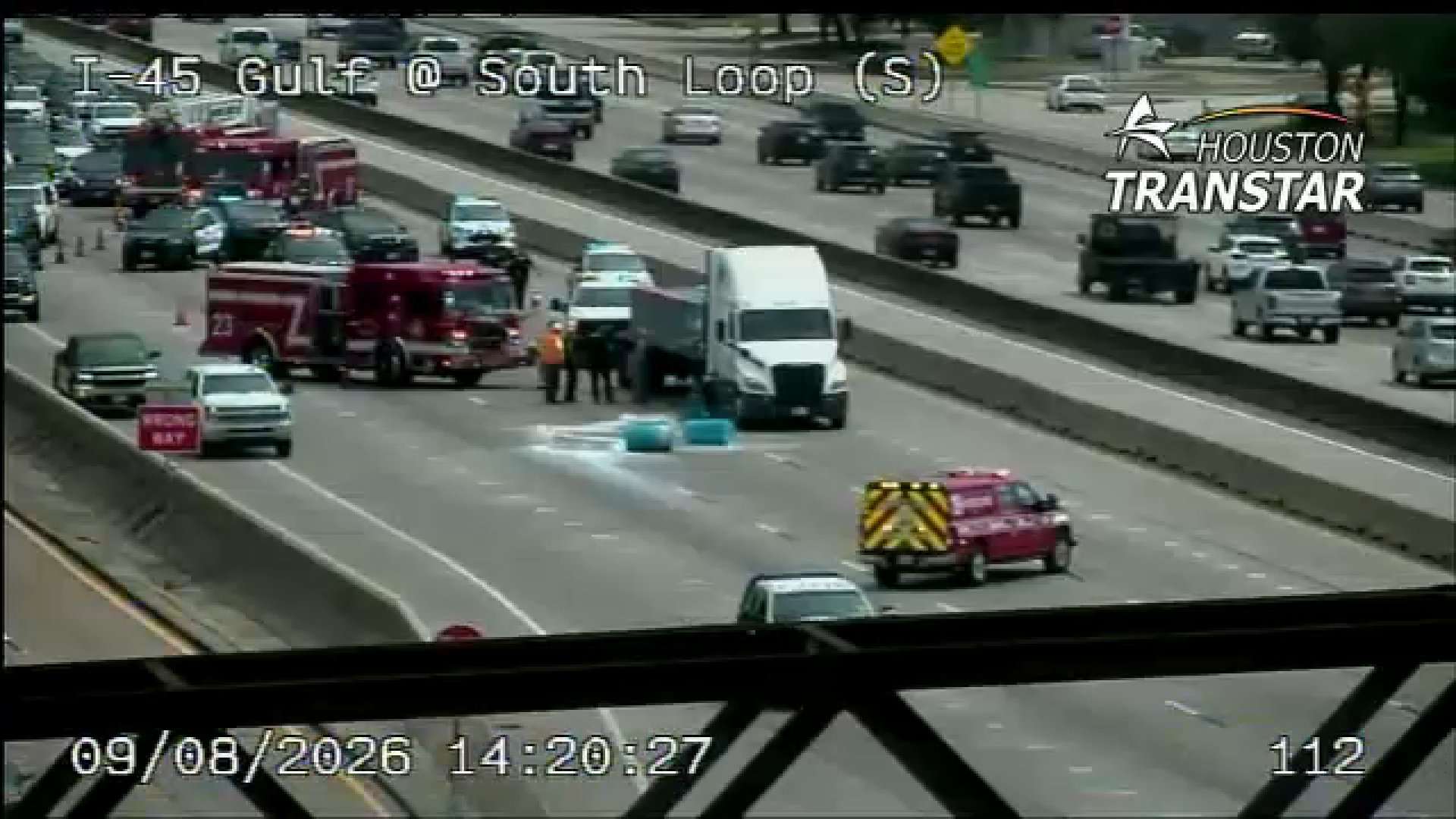 TranStar cameras captured the aftermath of the hazmat spill, with multiple mainlanes blocked as crews work to clean up the scene.