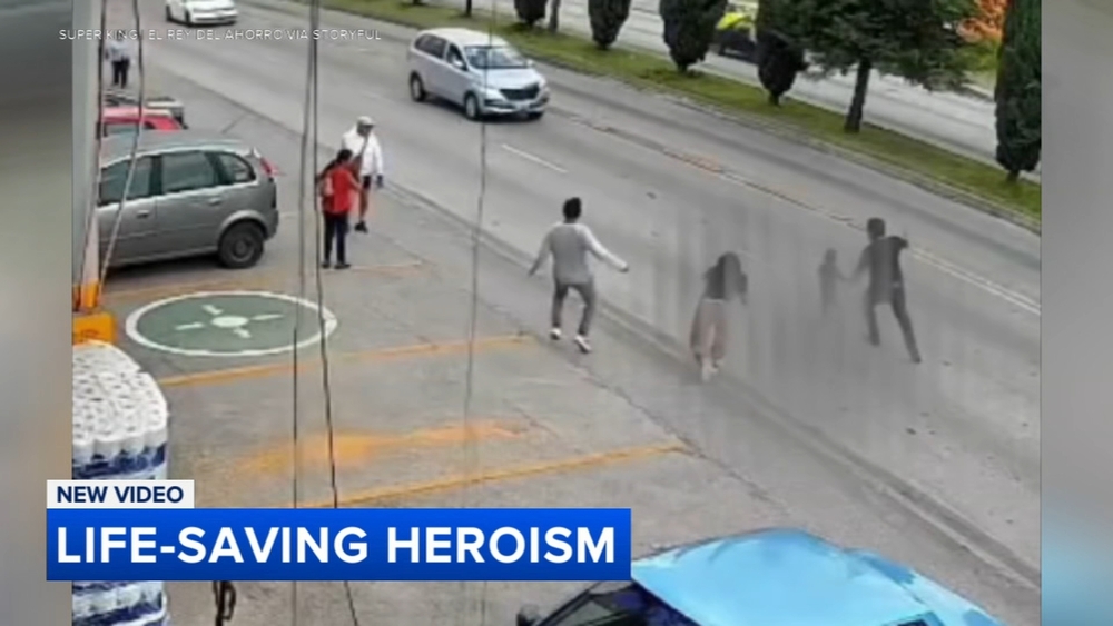 CCTV shows dramatic moment child is rescued after running into traffic