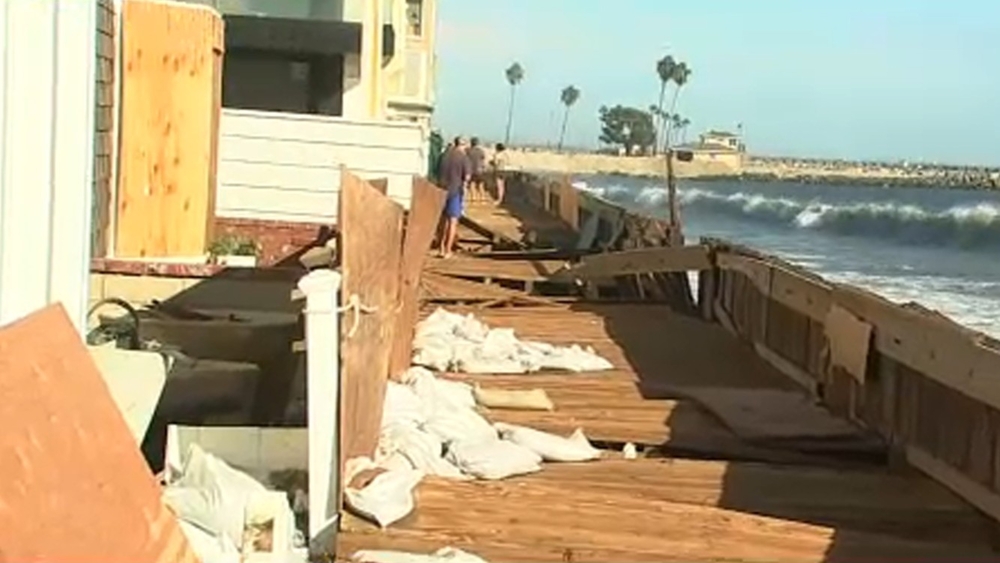 Boardwalk damaged, safety of homes questioned due to Long Beach waves