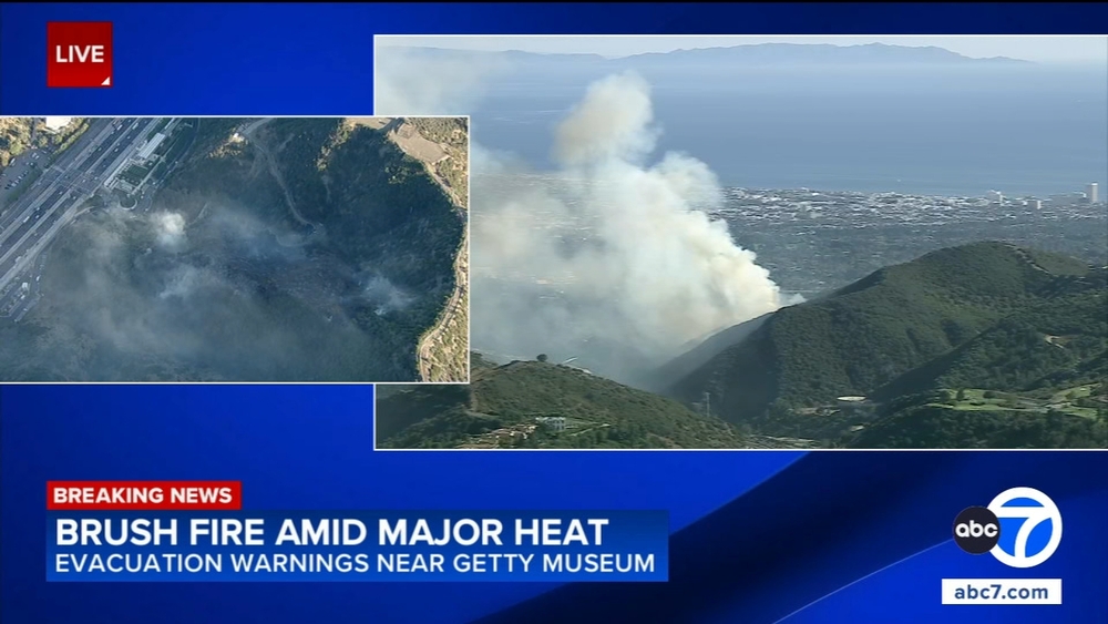 Brush fire near Getty Center prompts evacuation warnings