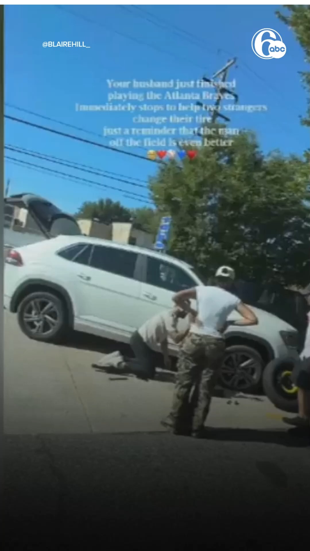 Phillies outfielder Derek Hill help fans change flat tire