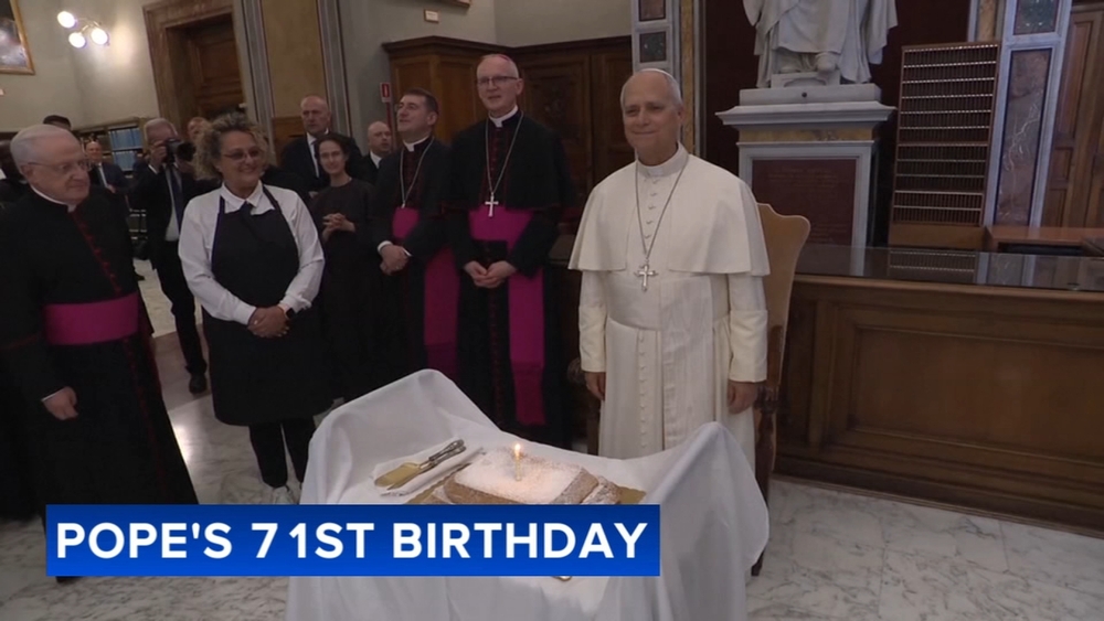 Pope Leo XIV blow out candles for 71st birthday