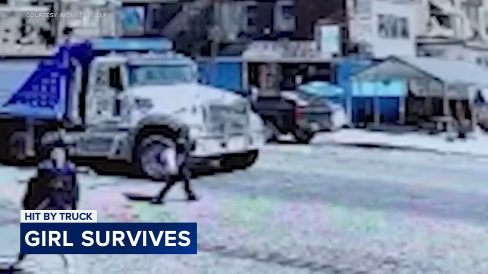 Girl pinned under truck walks away with minor injuries: witnesses