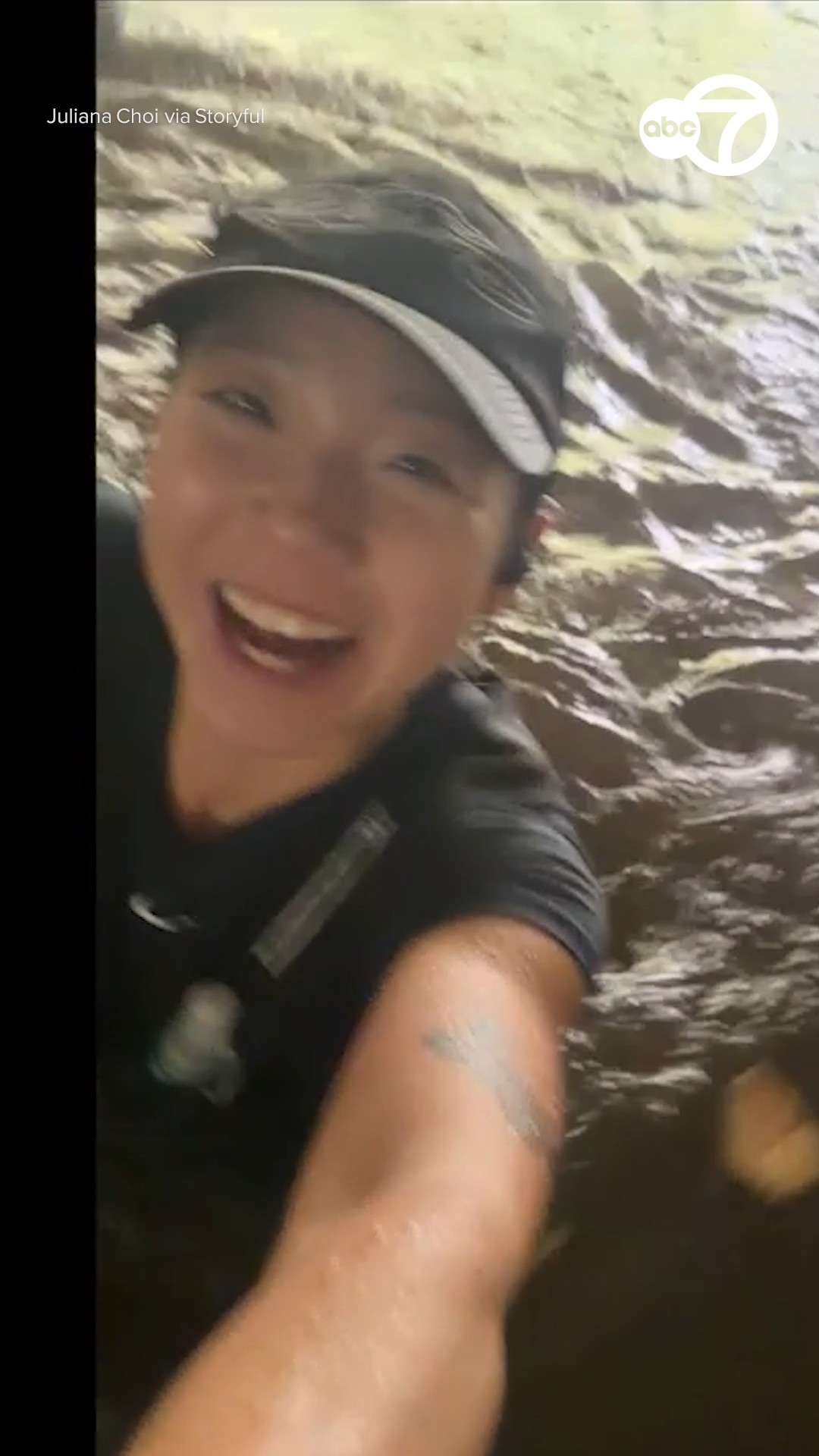 Fitness influencer smiles while running half-marathon in flooding 