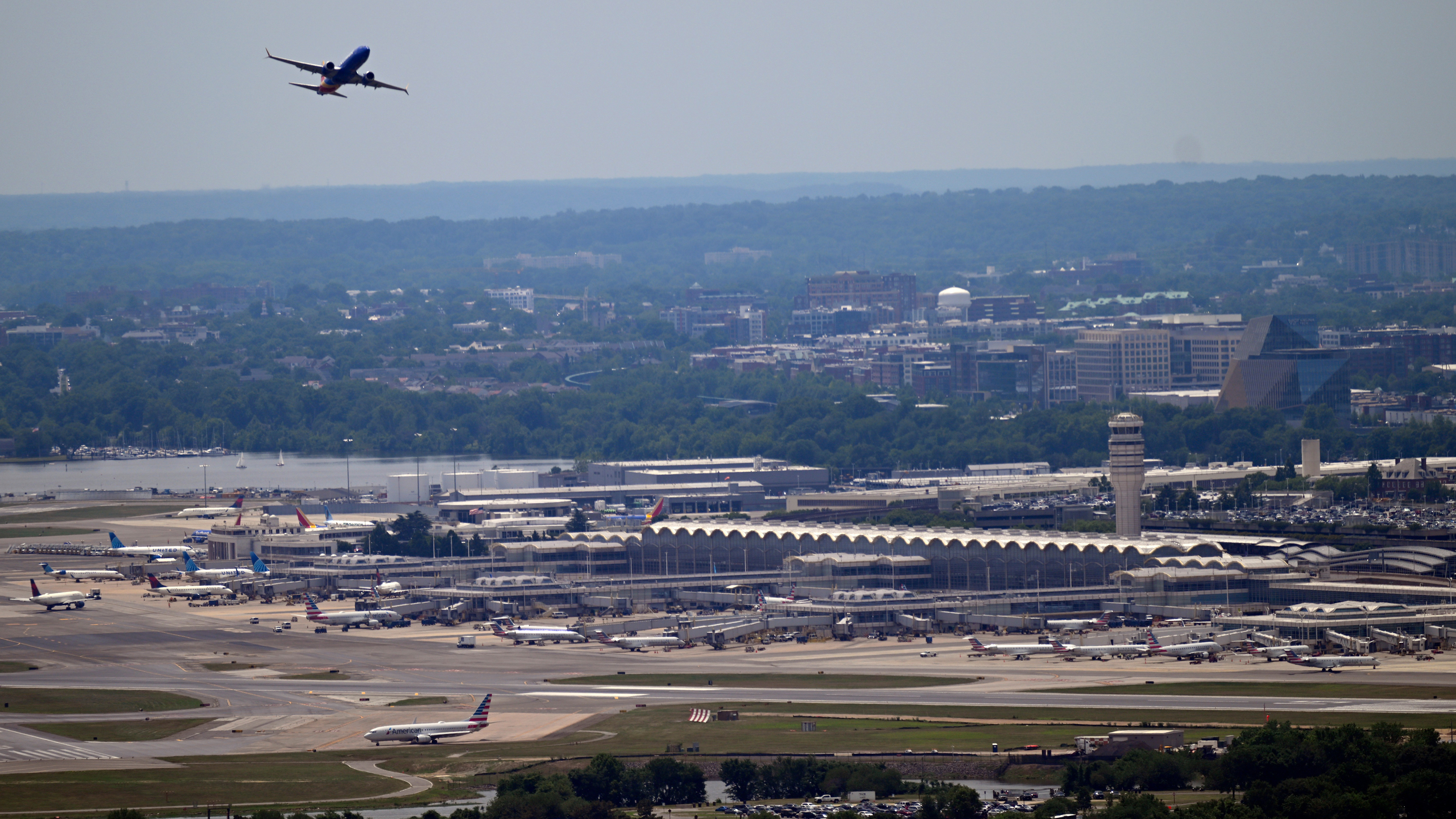 An airliner takes off from Washington Ronald Reagan National Airport, Saturday, June 6, 2026, in Washington.