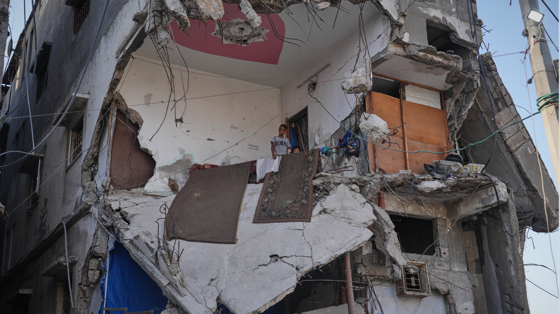 Displaced Palestinians shelter inside a building heavily damaged during the Israel-Hamas war in Gaza City, Thursday, Sept. 17, 2026.