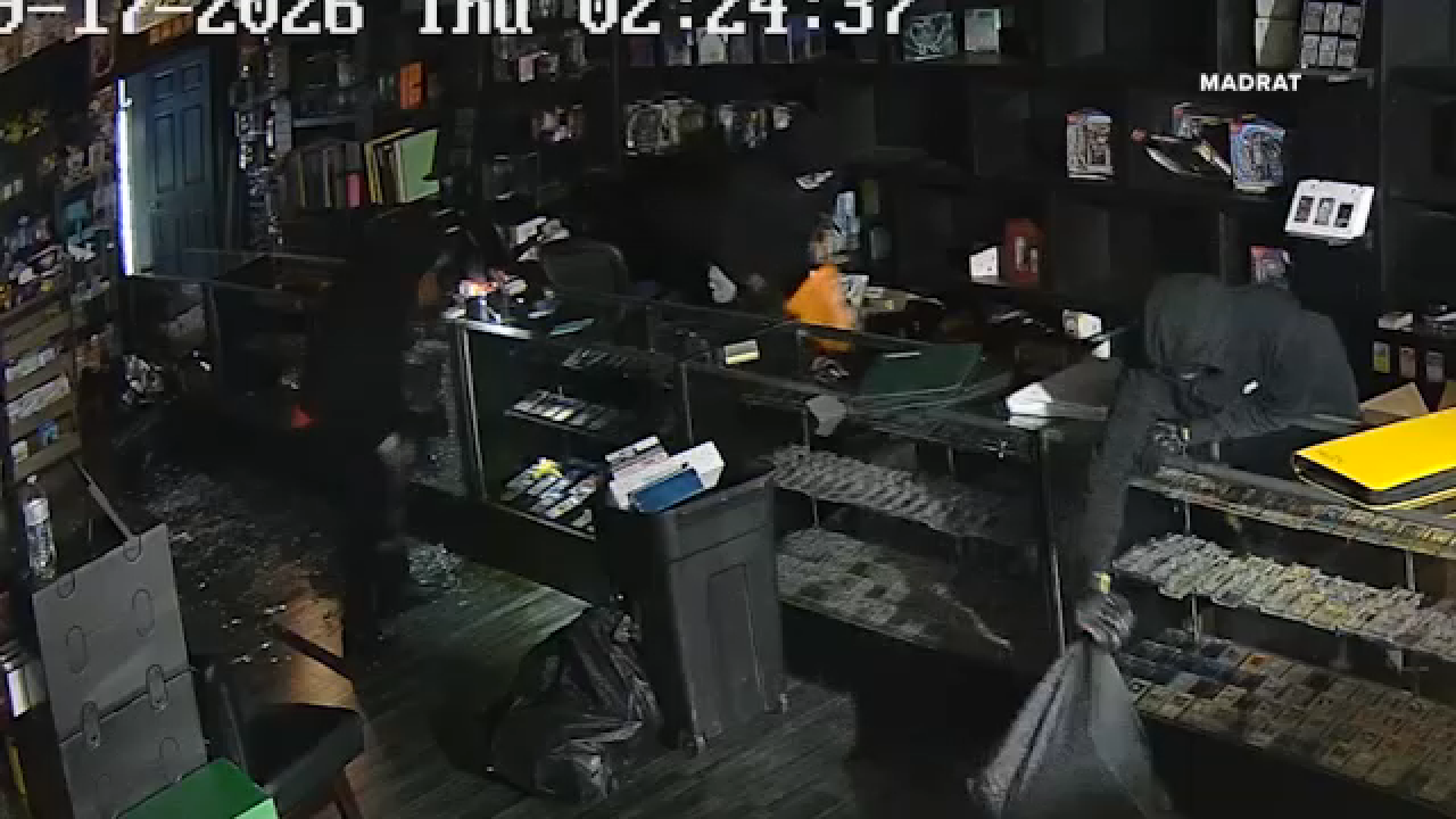 Surveillance video shows thieves targeted Houston-area trading card game shops