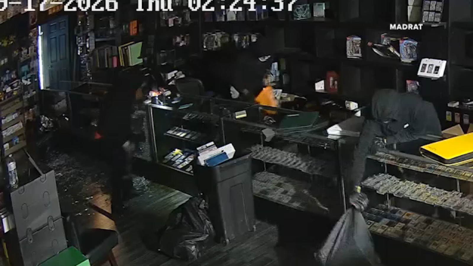 Surveillance video shows thieves targeted Houston-area trading card game shops
      