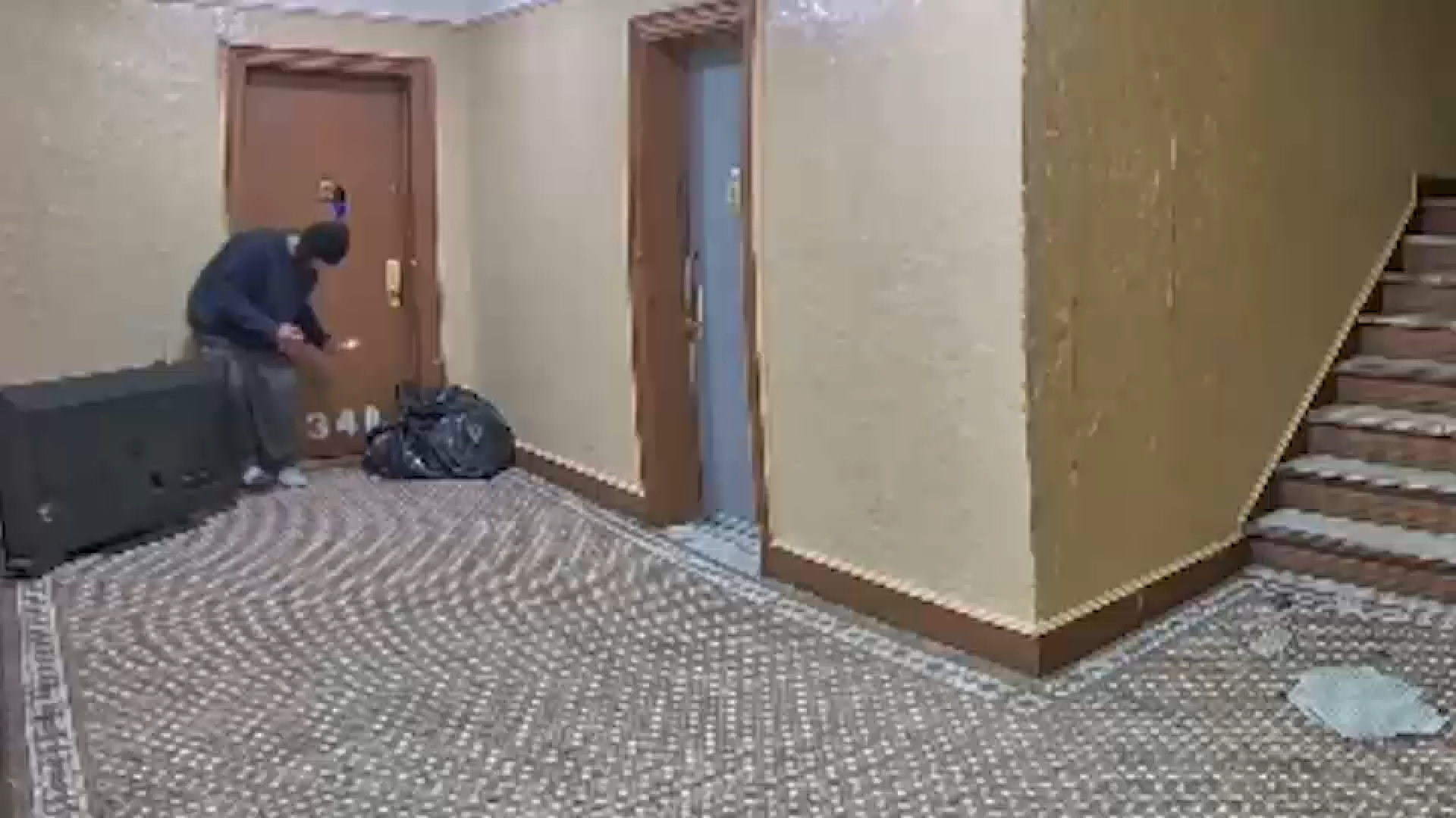 Video shows man holding flame in hallway before deadly Bronx fire broke out