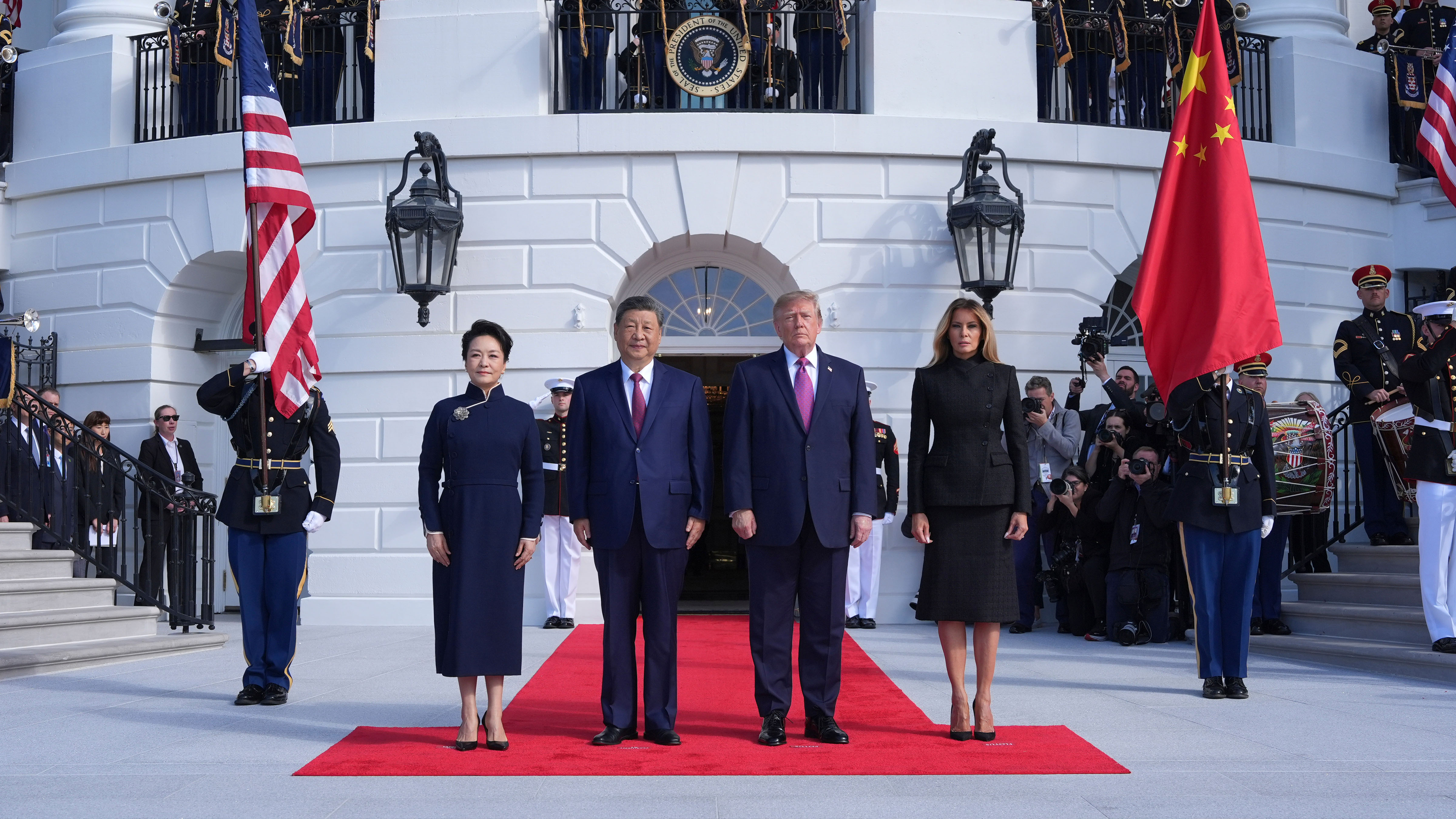 President Donald Trump, center right, and first lady Melania Trump, right, greet China's President Xi Jinping, center left, and his wife Peng Liyuan on the South Portico of the White House, Thursday, Sept. 24, 2026, in Washington.