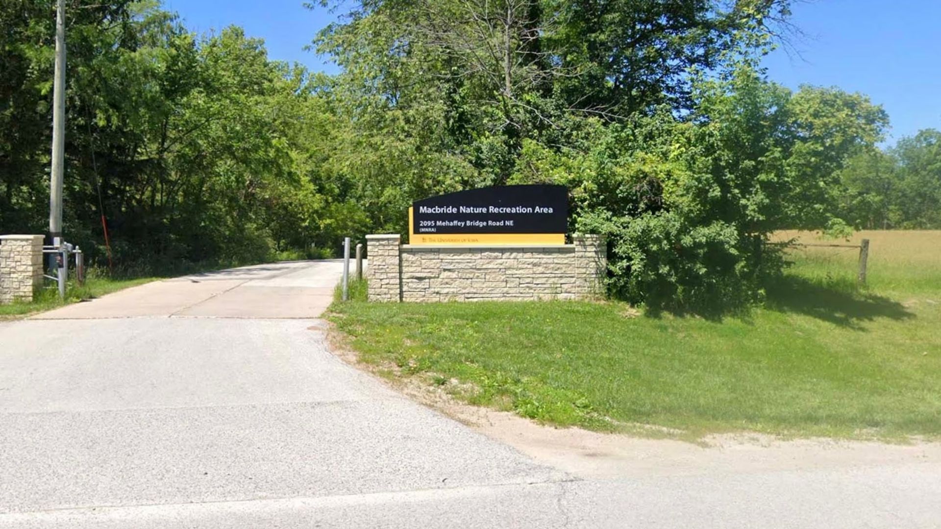 The sign for MacBride Nature Recreation Area is shown in Solon, Iowa.