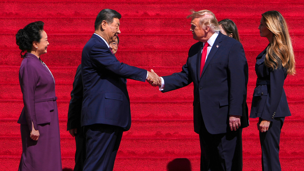Trump wraps visit with Xi with trip to National Archives