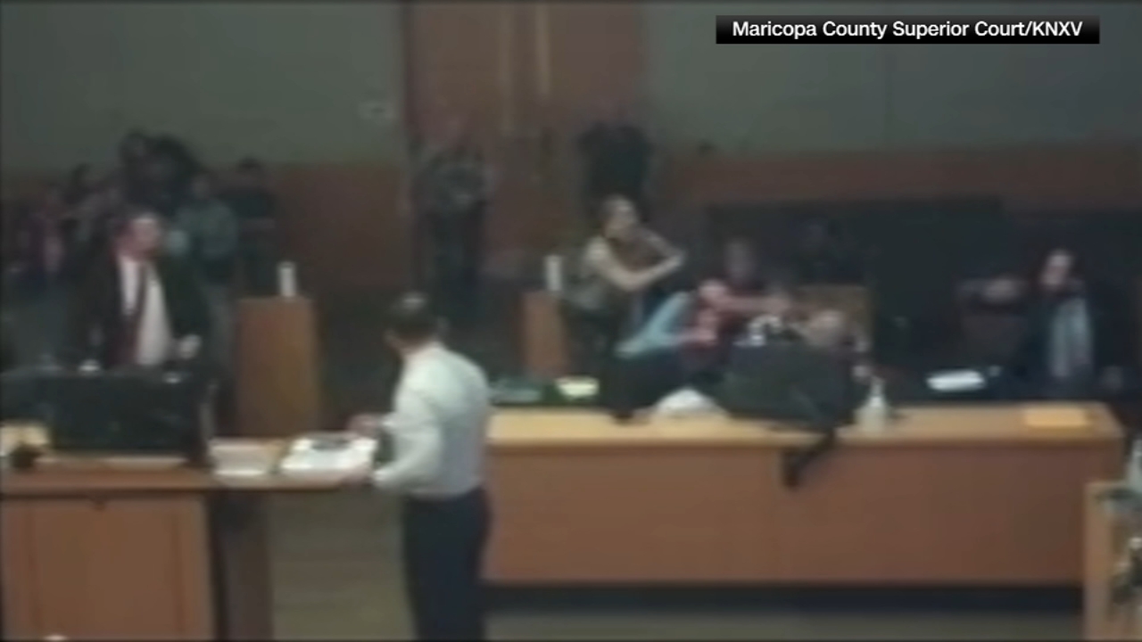 Father-in-law of David Navidad-Parra punches convicted killer Abel Uribe in court after spotting him laughing during sentencing hearing in Phoenix, Arizona
