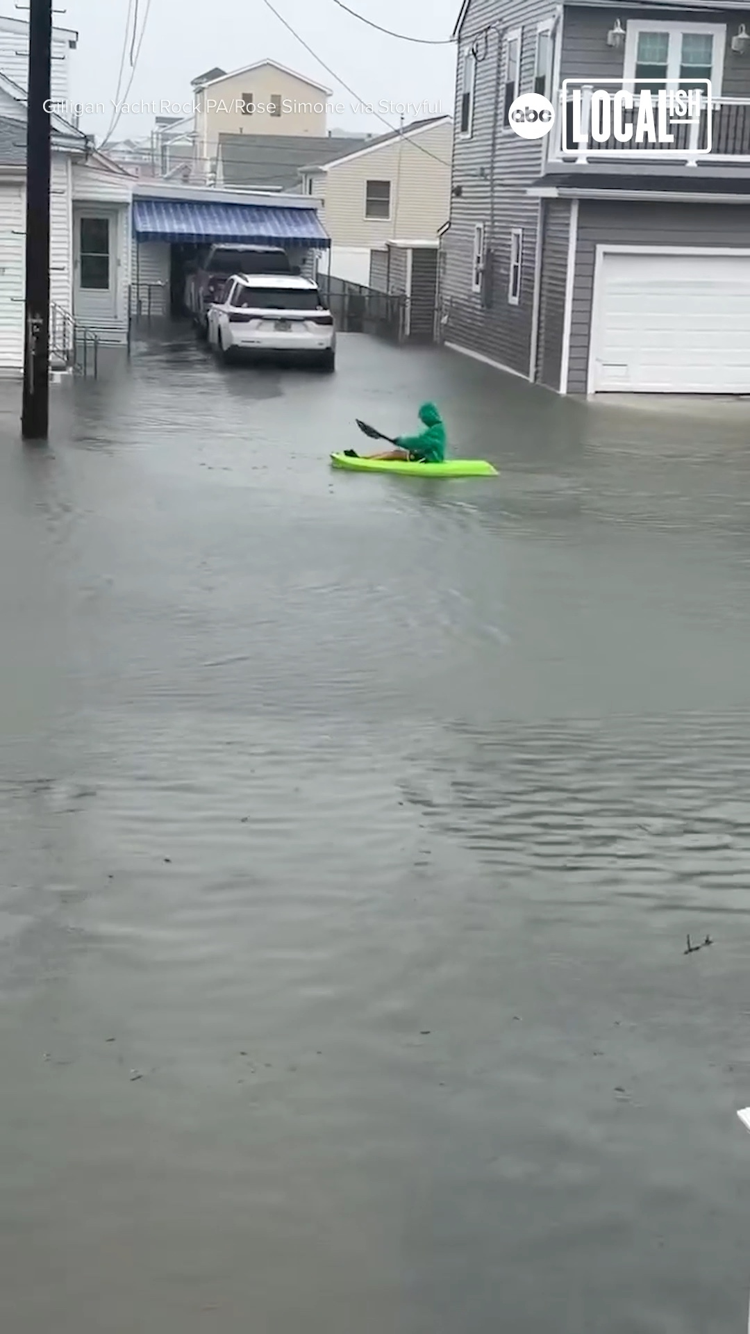 Flooded streets aren't a problem for these determined kayakers!