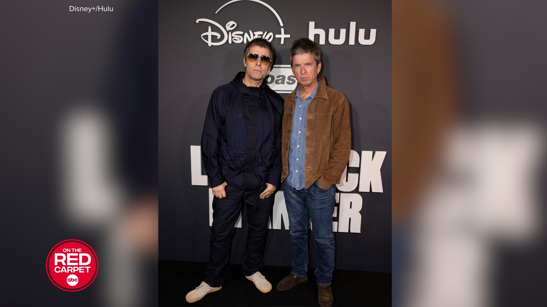 Liam and Noel Gallagher posing together at the premiere of Disney+ and Hulu's "Oasis: Don't Look Back In Anger" documentary.