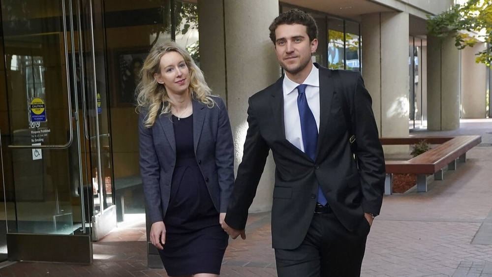 Holmes says she's fighting to prove her innocence in post from prison