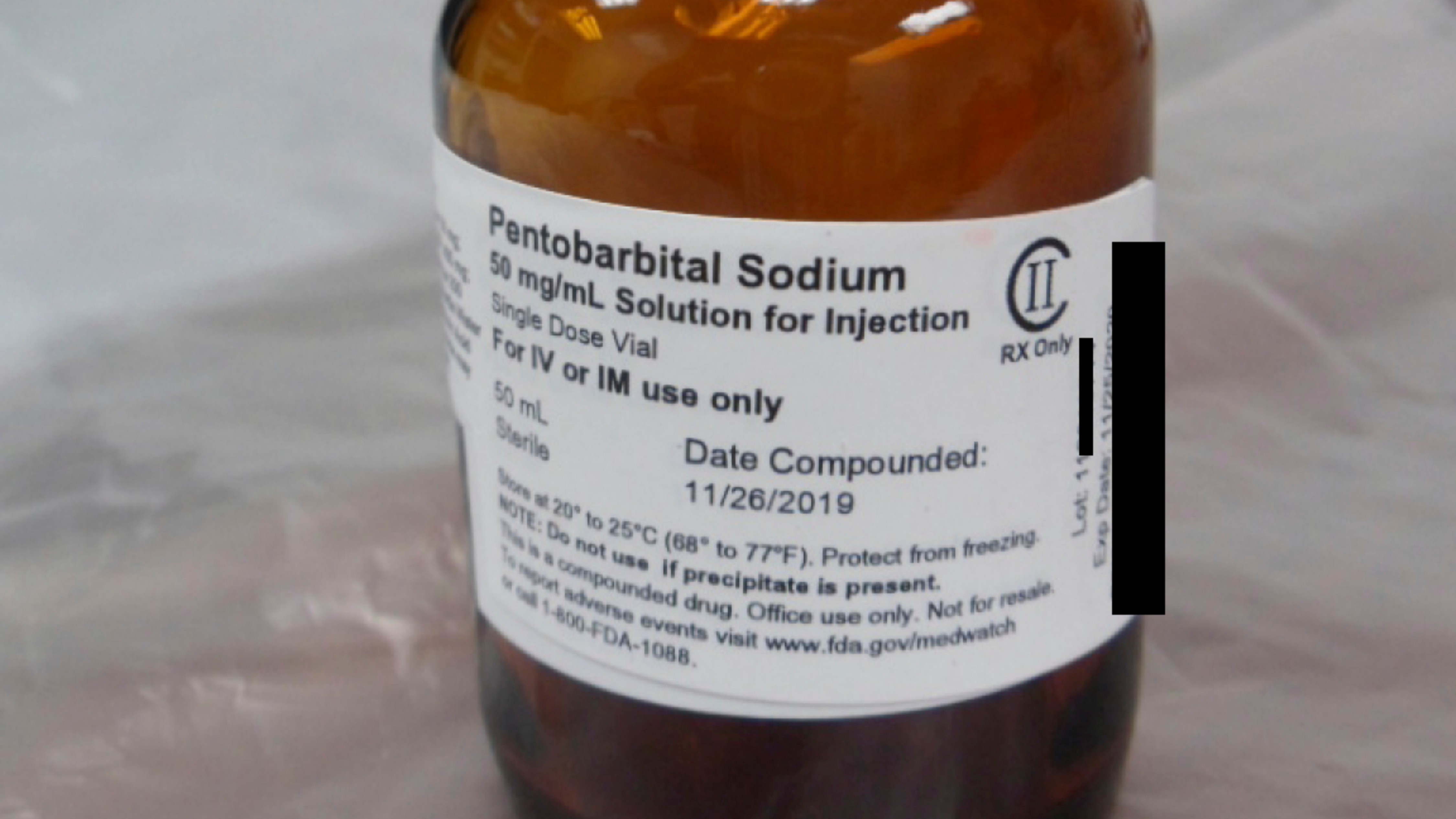 This photo provided by the U.S. Department of Justice shows a vial of pentobarbital used in the executions of two inmates in July 2020, according to court filings.