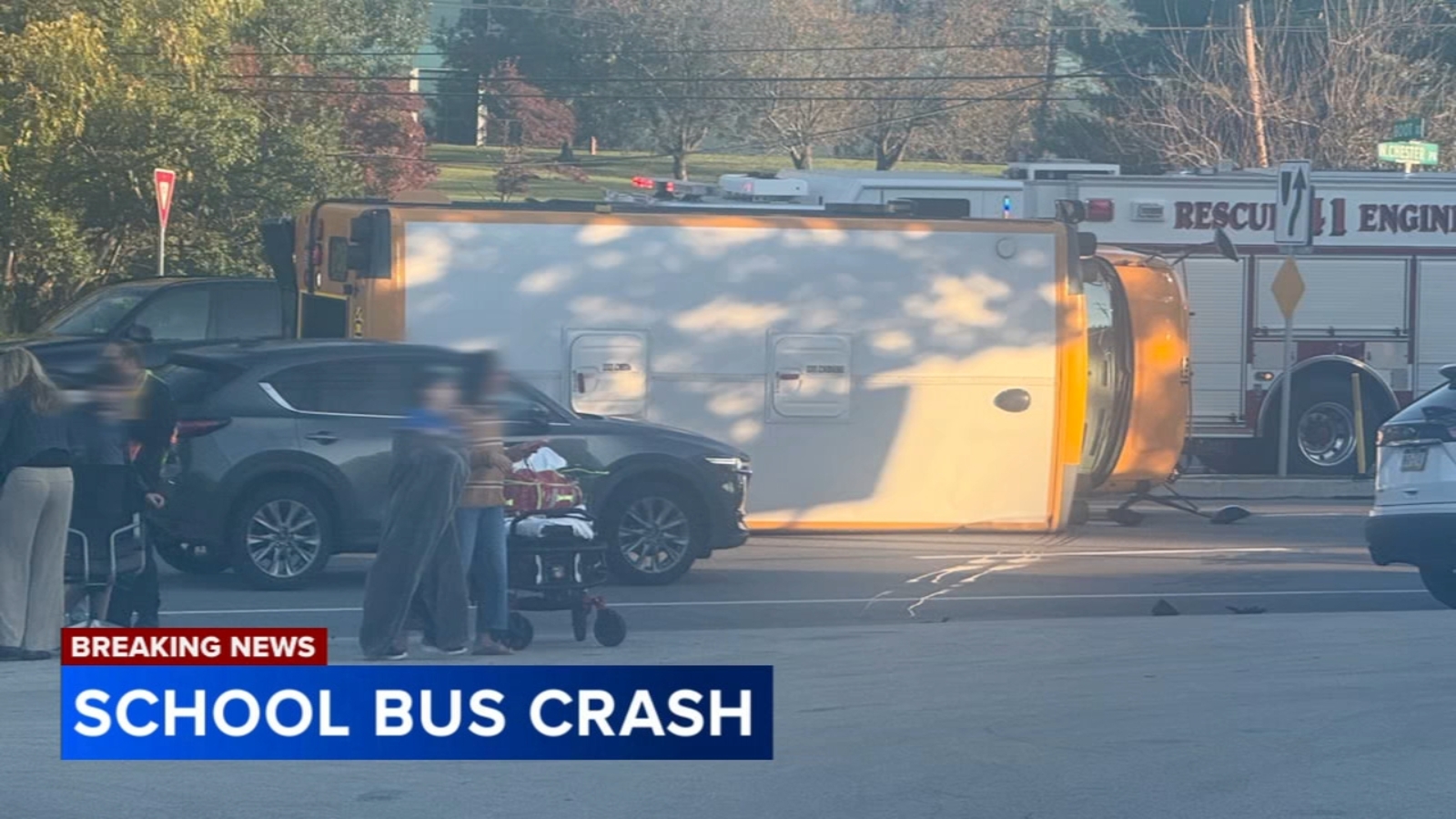4 students injured after school bus overturns after crash in Newtown ...
