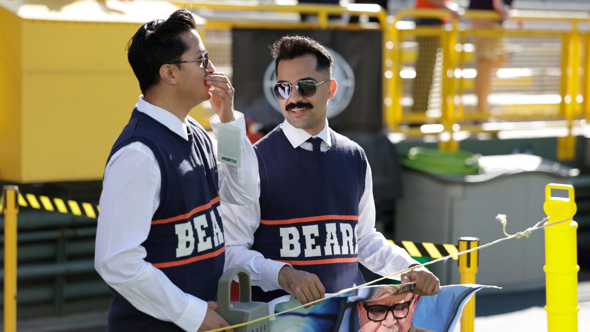 Chicago Bears fans dress up as Mike Ditka before an NFL football game against the Green Bay Packers in Green Bay, Wis., Sunday, Oct. 11, 2026.