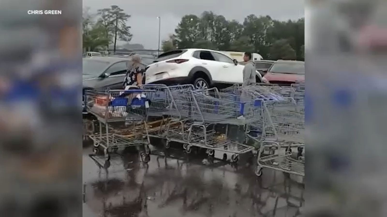 Image for Powerful storm, possible tornadoes rip through Fayetteville, down trees, flip cars