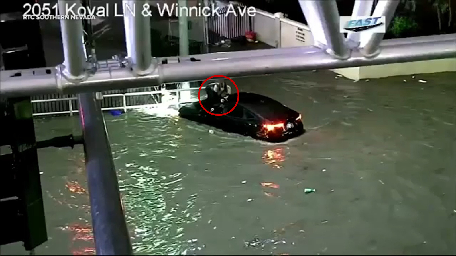 Rescuers save woman stranded on top of car in flooded Las Vegas street amid Tropical Storm Rachel rainfall Rescuers save woman stranded on top of car in flooded Las Vegas street amid Tropical Storm Rachel rainfall