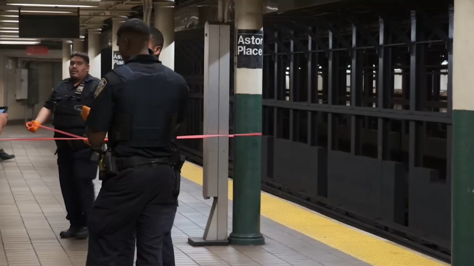 Police search for masked suspect in East Village subway stabbing
