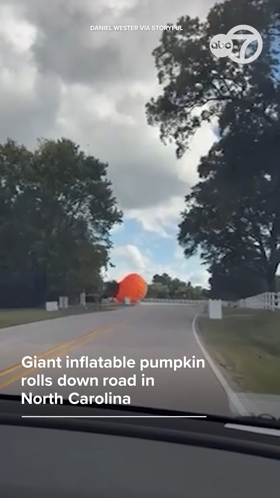 Giant inflatable pumpkin rolls down road in North Carolina