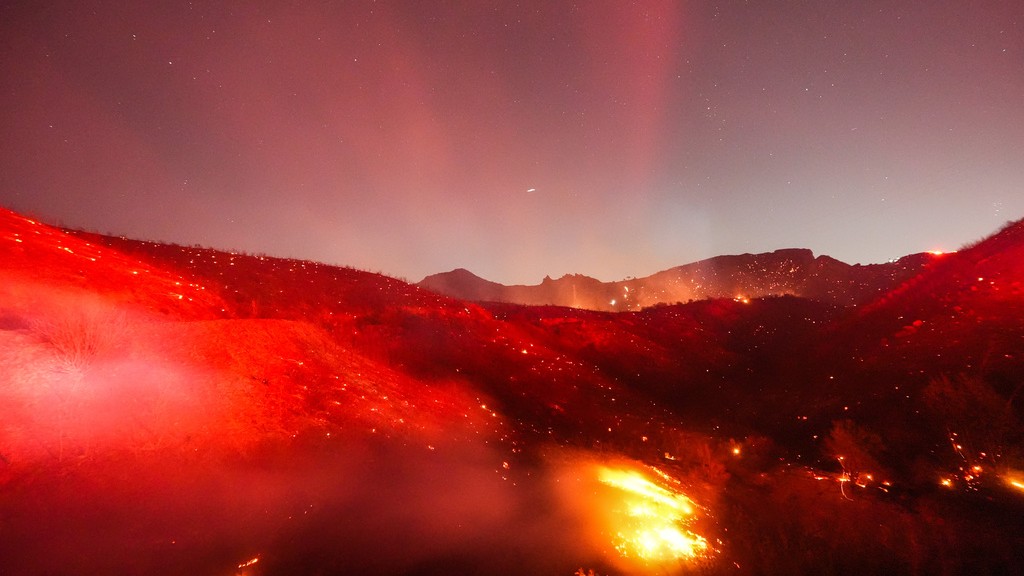Hot, windy weather stokes brush fires in SoCal amid power shutoffs