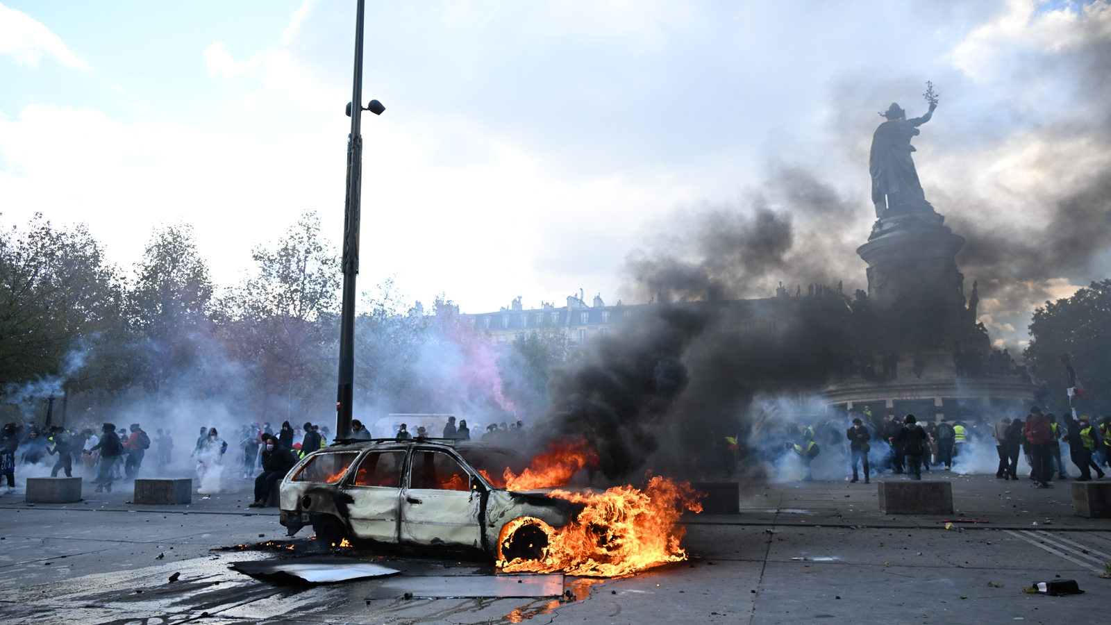 Clashes and fires break out as protesters rally across France, joining students