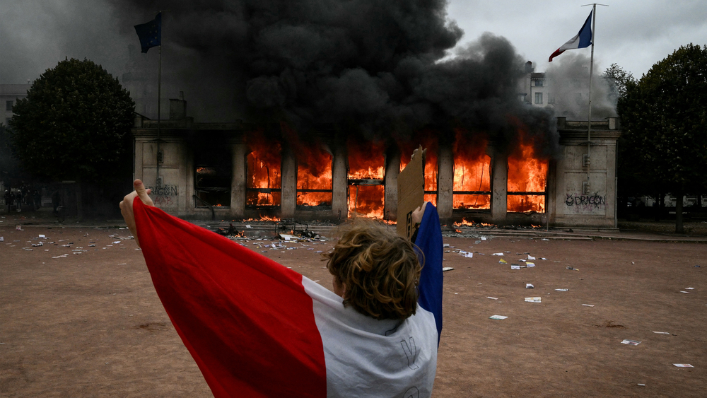 France's PM calls for localized curfews to curb rioting and looting