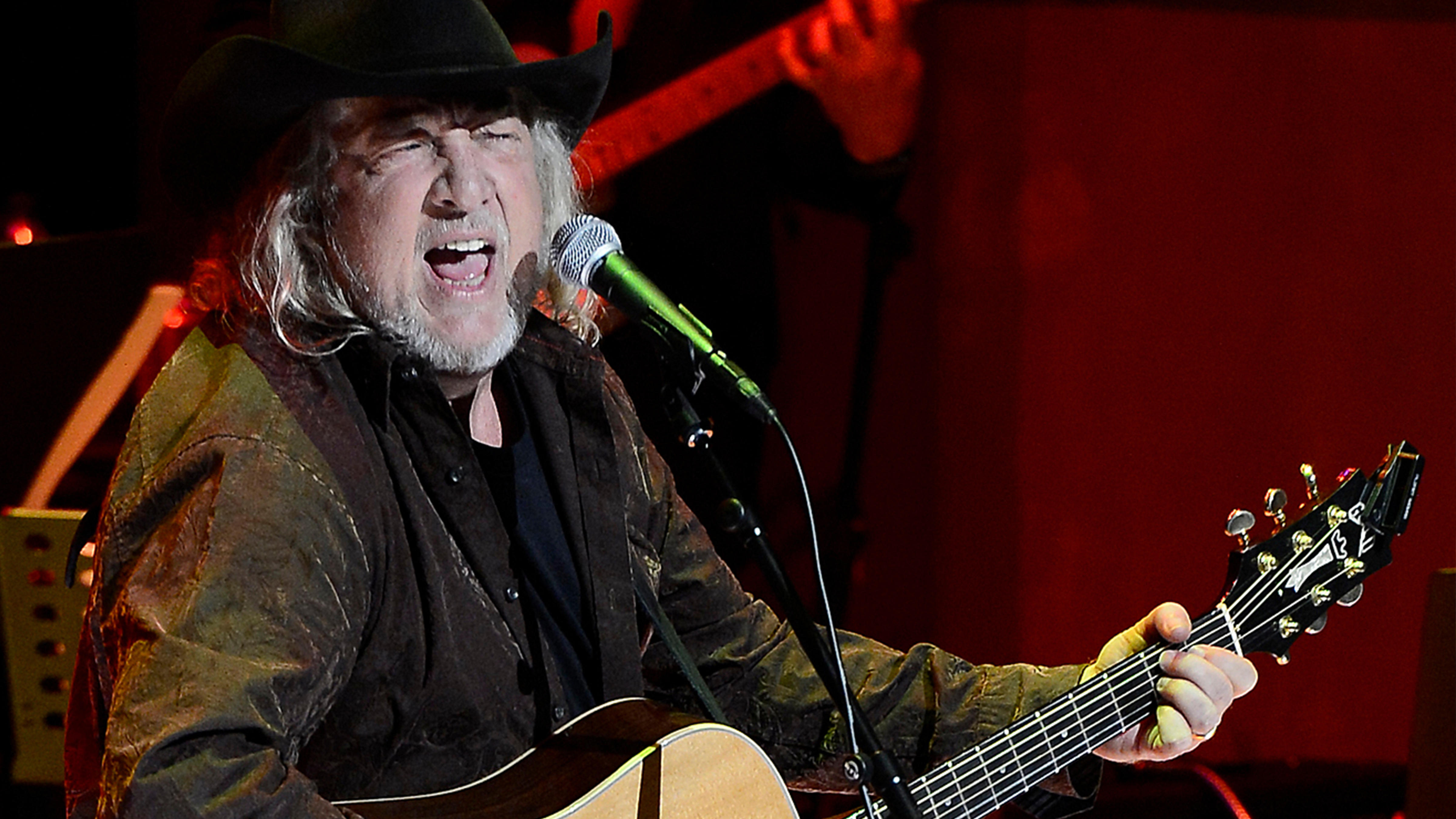 John Anderson performs at the ceremony for the 2013 inductions into the Country Music Hall of Fame in Nashville, Tenn., on Oct. 27, 2013.