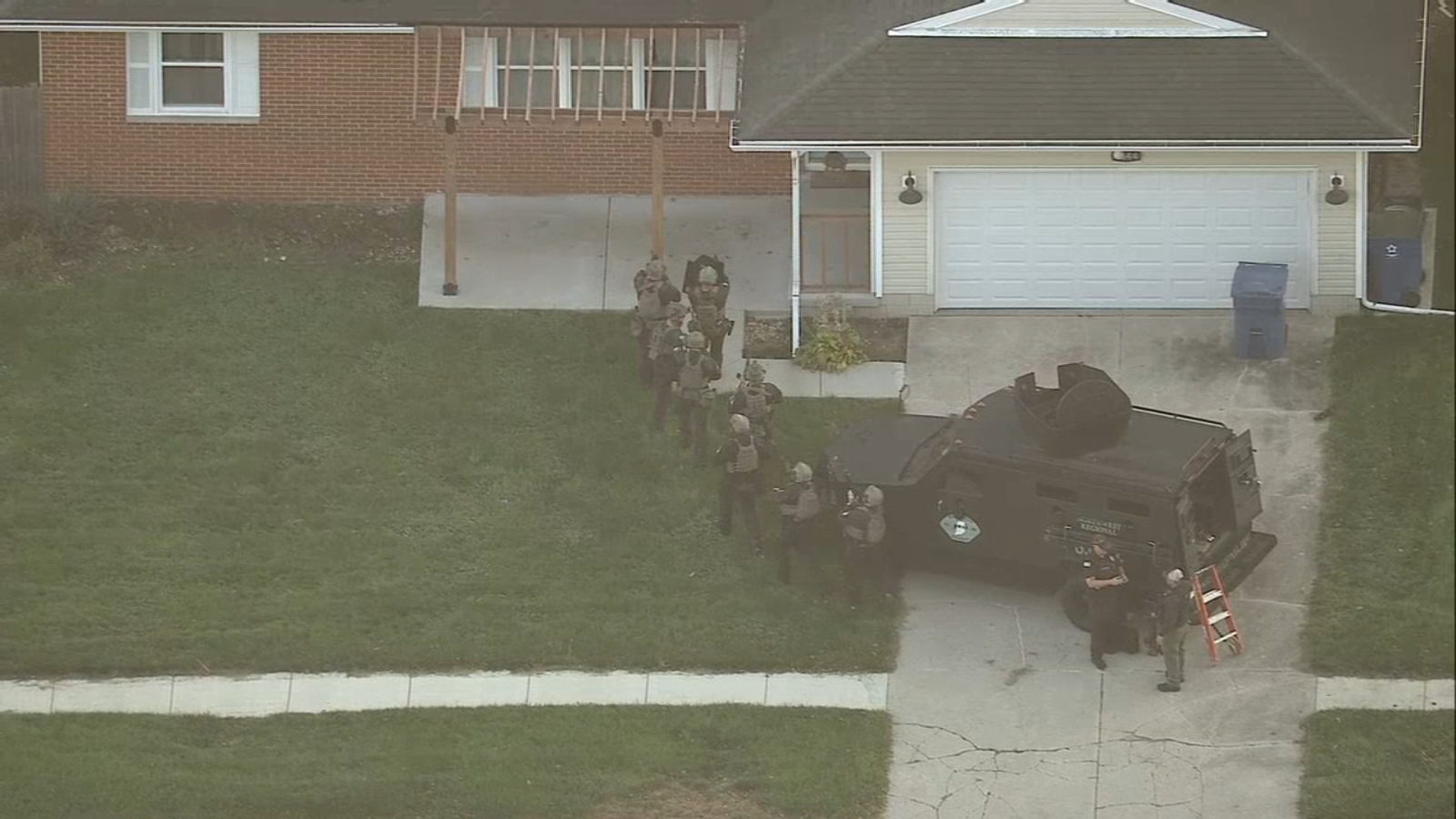 SWAT teams respond to home in Lowell, Indiana, video shows
      