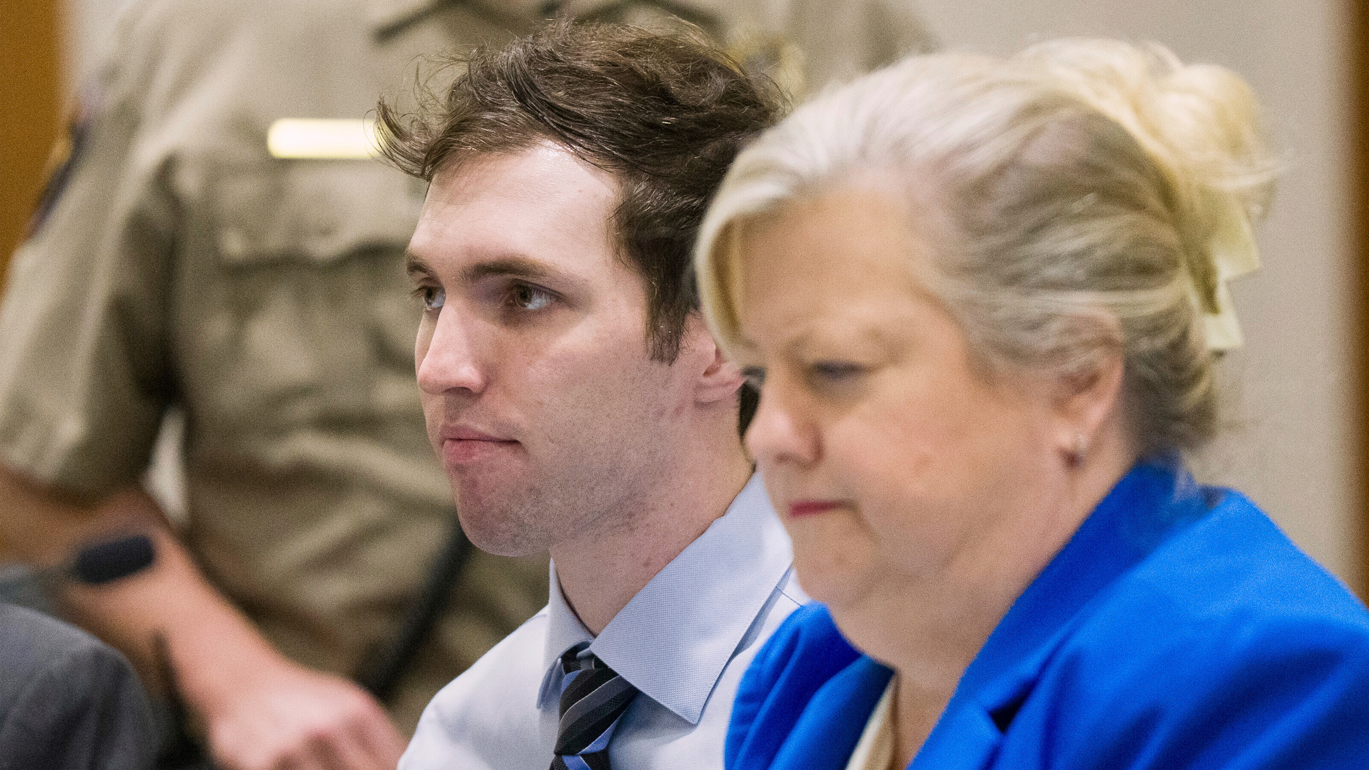 Tyler Robinson, who is accused of fatally shooting Charlie Kirk, sits beside defense attorney Kathryn Nester during a hearing in 4th District Court in Provo, Utah, on Jan. 16, 2026.