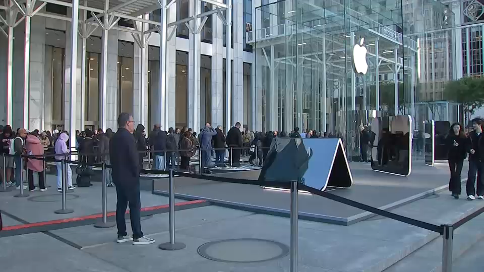 Lines wrap around Apple flagship store on Fifth Avenue in Midtown for new iPhone Duo release