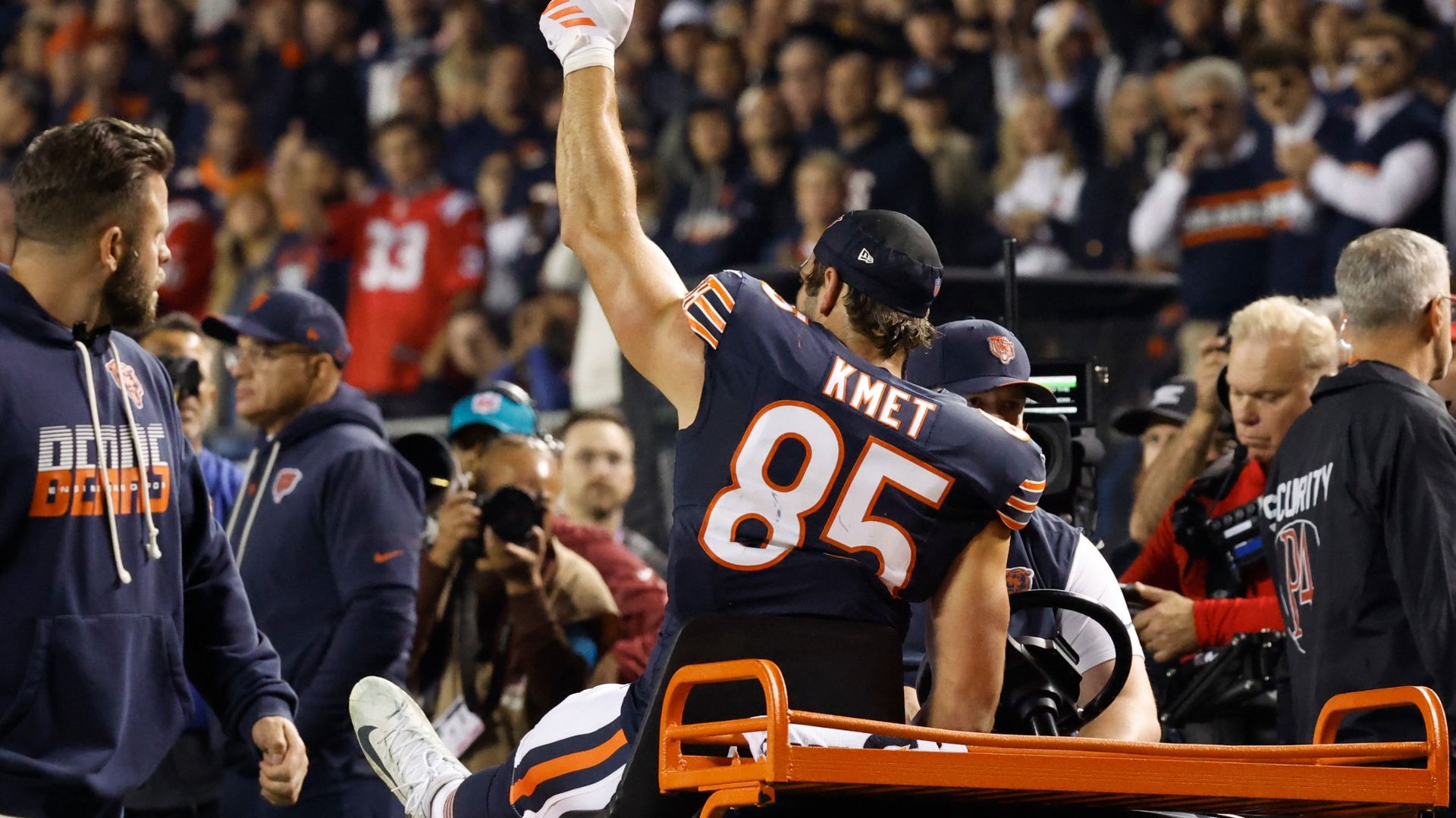 Chicago Bears tight end Cole Kmet gives a thumbs up after being tackled by the New England Patriots in Chicago, Thursday, Oct. 22, 2026. Kmet was injured during the play.