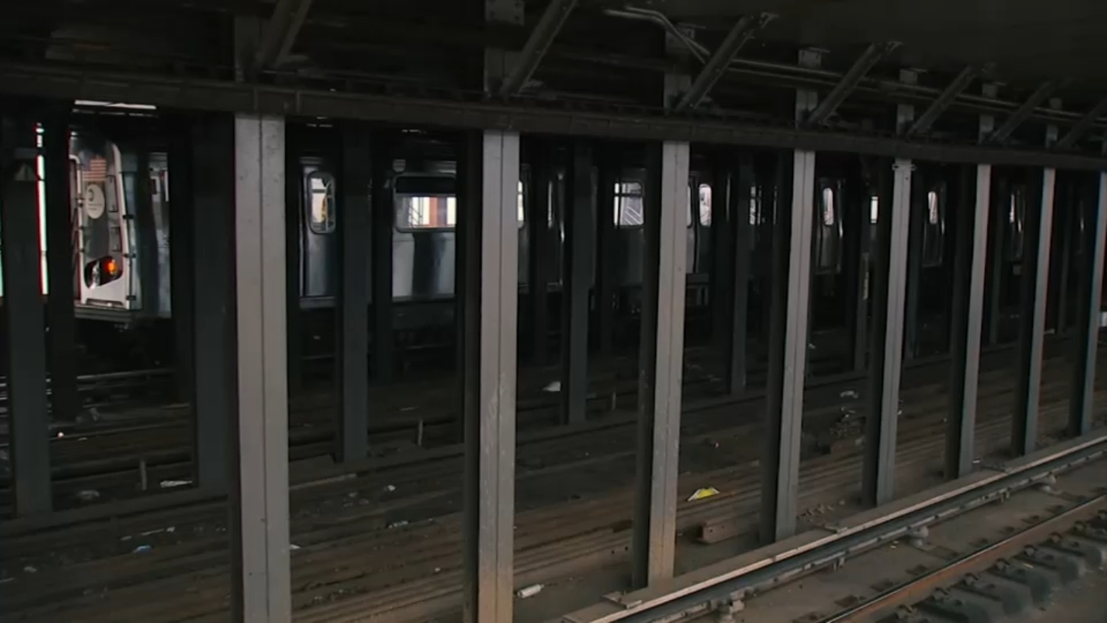 MTA worker burned after being hit by spark from passing train
