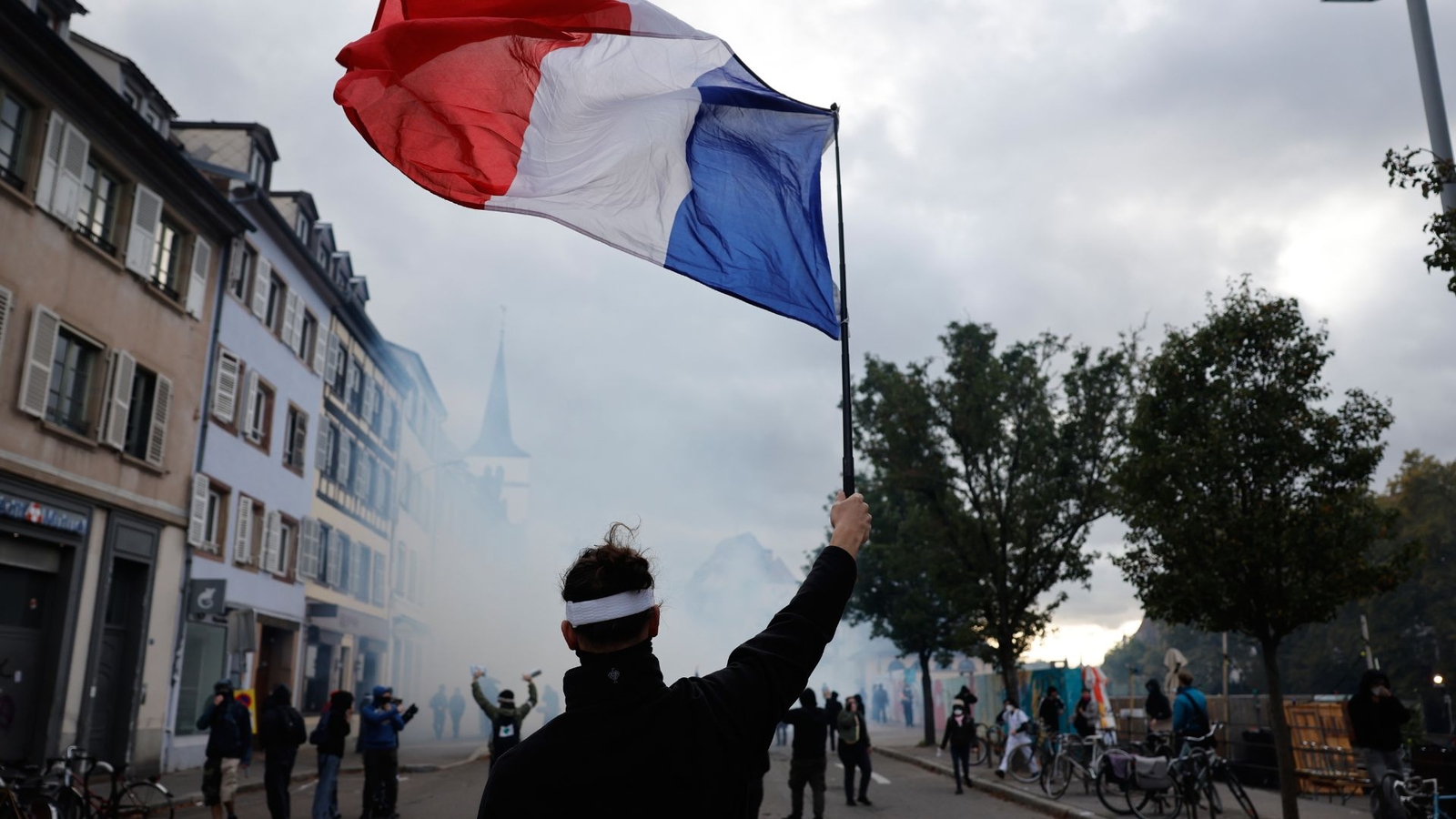 More than 400,000 protest across France, challenging Macron as Paris clashes erupt